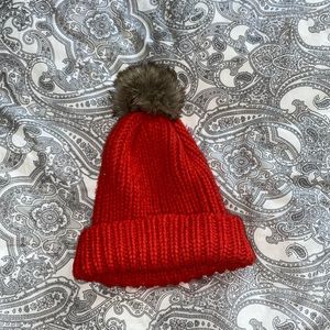 Orange puff ball hat